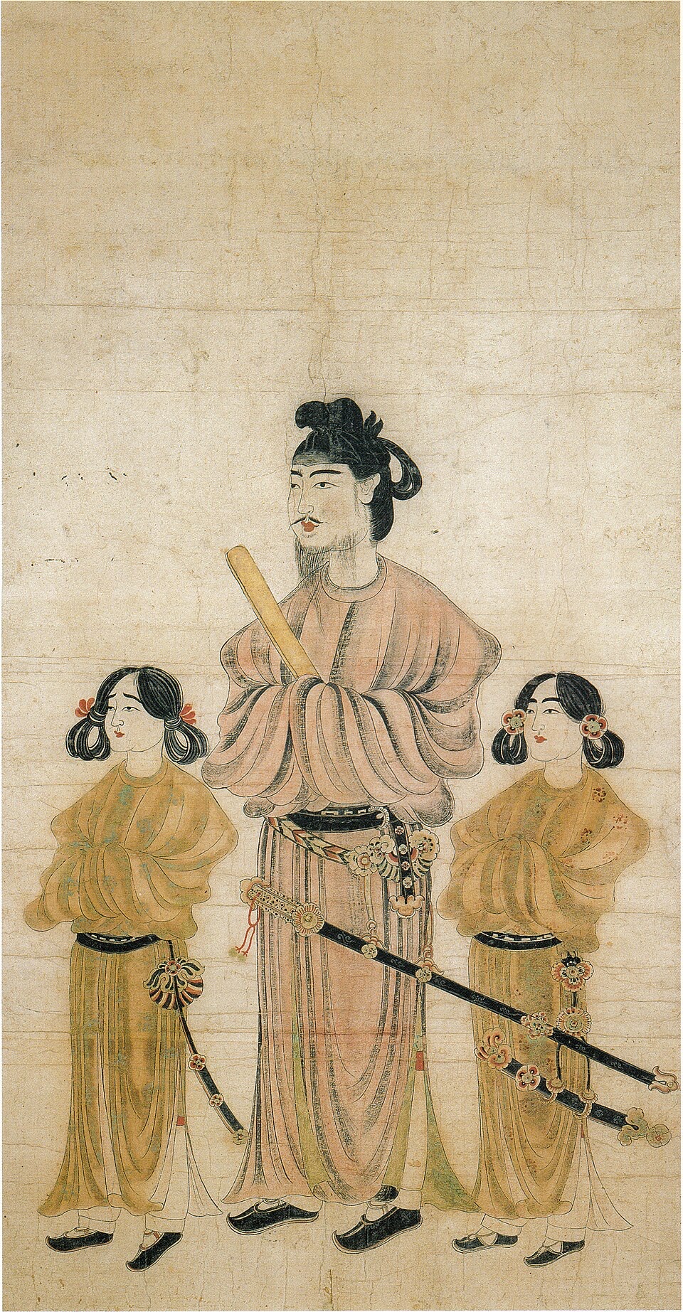 The oldest portrait in Japan, traditionally said to be painted by Prince Asa of Baekje. Prince Shōtoku wears a round-collared robe, a black cap and a straight sword, and holds a flat baton; the boys beside him wear their hair looped at the ears.