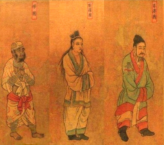 Three envoys side by side in the Tang scroll attributed to Yan Liben: the Wa envoy barefoot in a wrapped cloth, the Silla envoy young with long loose hair under a small black cap, and the Baekje envoy bearded in a green robe banded in red.