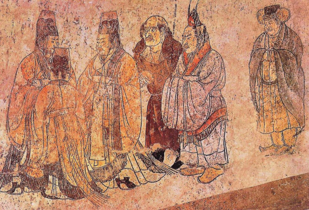 Tang officials receive three foreign envoys in this mural from the tomb of Prince Zhanghuai near Xi’an. The envoy in a cap with two upright feathers is generally identified as coming from the Korean peninsula, showing that the feathered cap still marked Koreans at the Tang court.