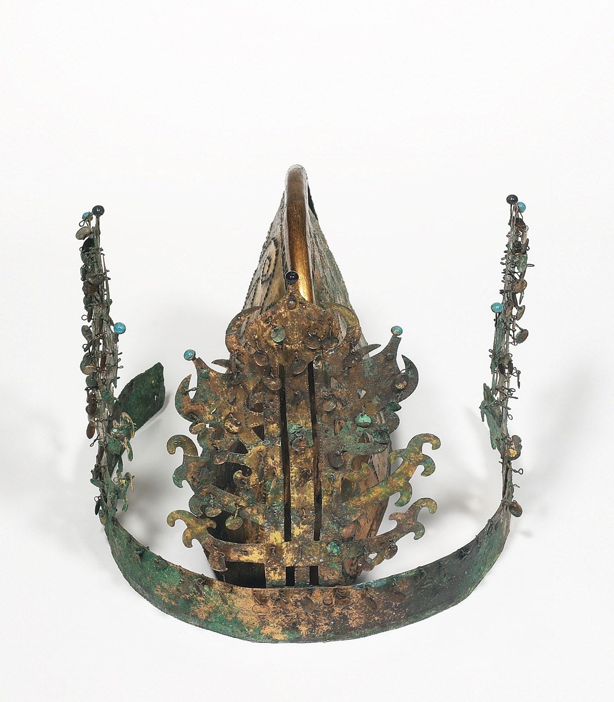 Gilt-bronze crown from Tomb 9 at Sinchon-ri, Naju, in the southwest of the Baekje sphere. It has two parts: a pointed inner cap made of two plates, and an outer band with complex plant-shaped uprights, unlike the tree shapes of Silla crowns.