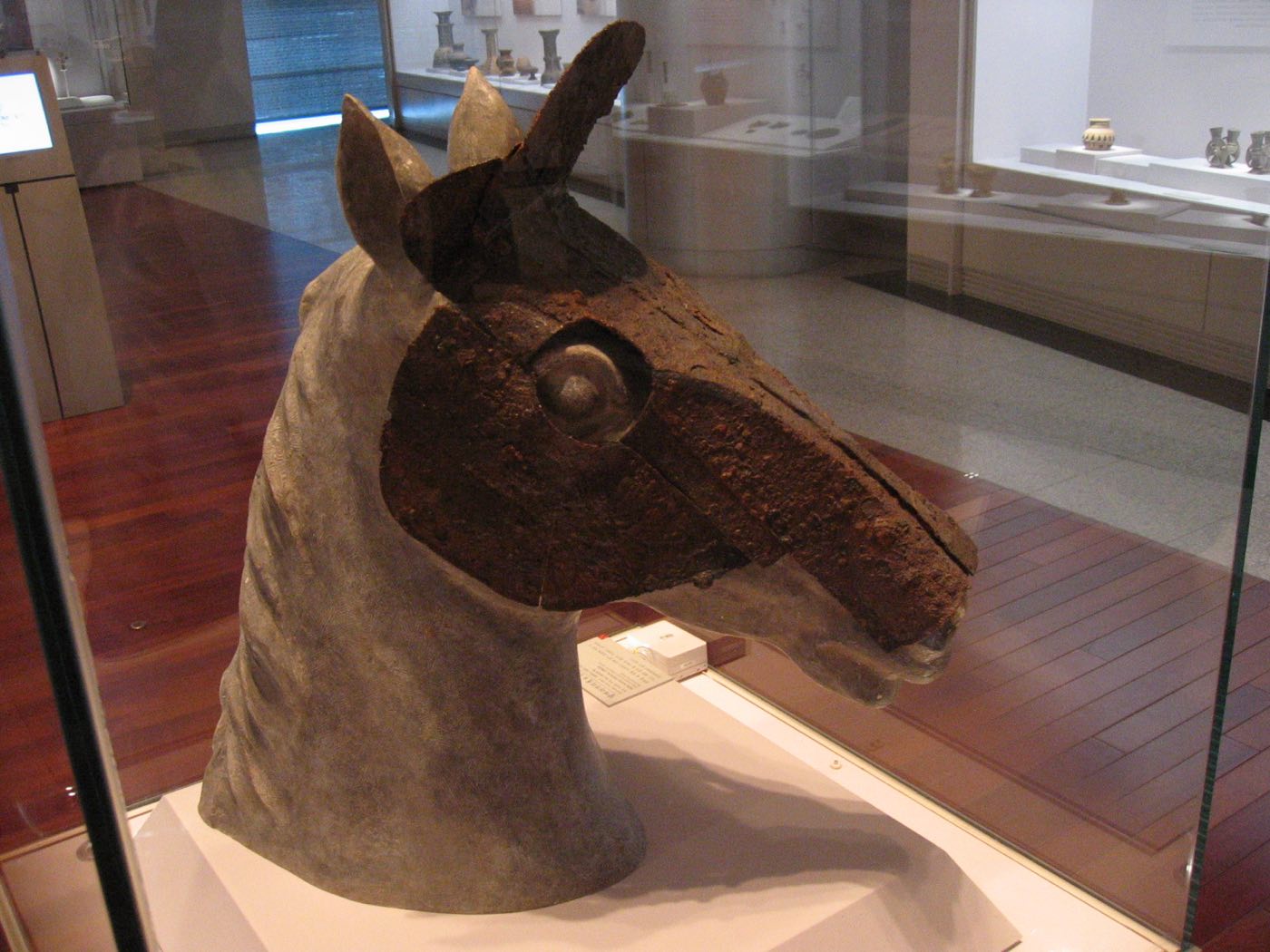 Iron helmet that covered a war horse’s face, shown on a model head in the National Museum of Korea. Gaya tombs such as those at Haman and Gimhae have yielded horse helmets and full horse armour.