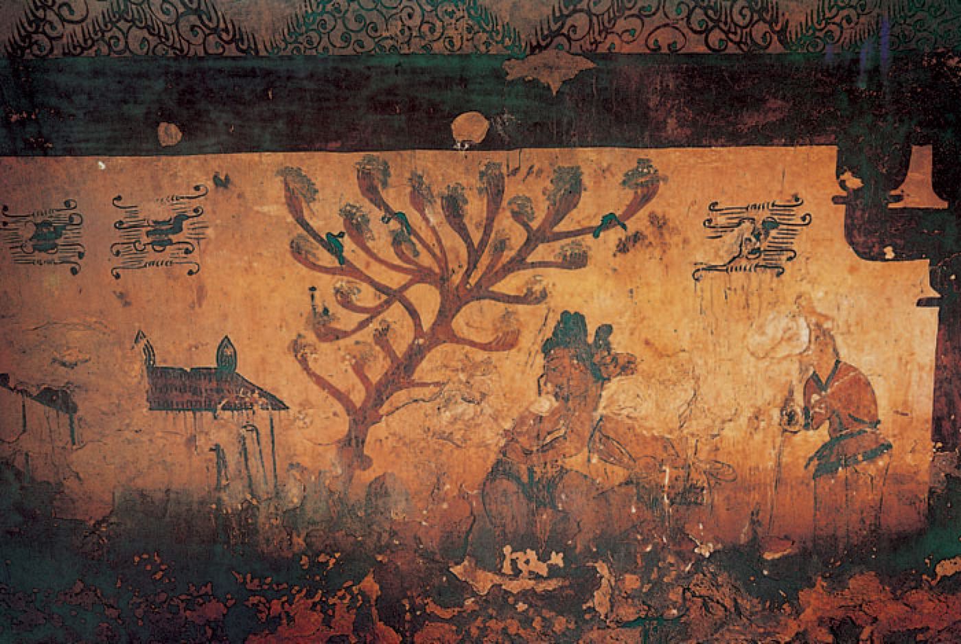Two men grapple in a ssireum match under a tree in the Gakjeochong (Tomb of the Wrestlers) mural at Ji’an, watched by an old man with a stick. One wrestler has a large nose and is often read as a man from the Western Regions; both wear only loincloths, with their hair tied up.