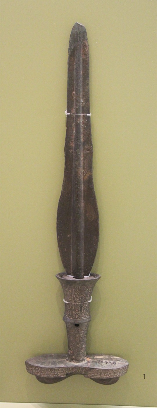 Lute-shaped bronze dagger, 42 cm long, from Sincheon in Hwanghae Province. Daggers of this type, with a separate hilt, are found across Liaoning and northern Korea and are the signature object of Gojoseon culture.
